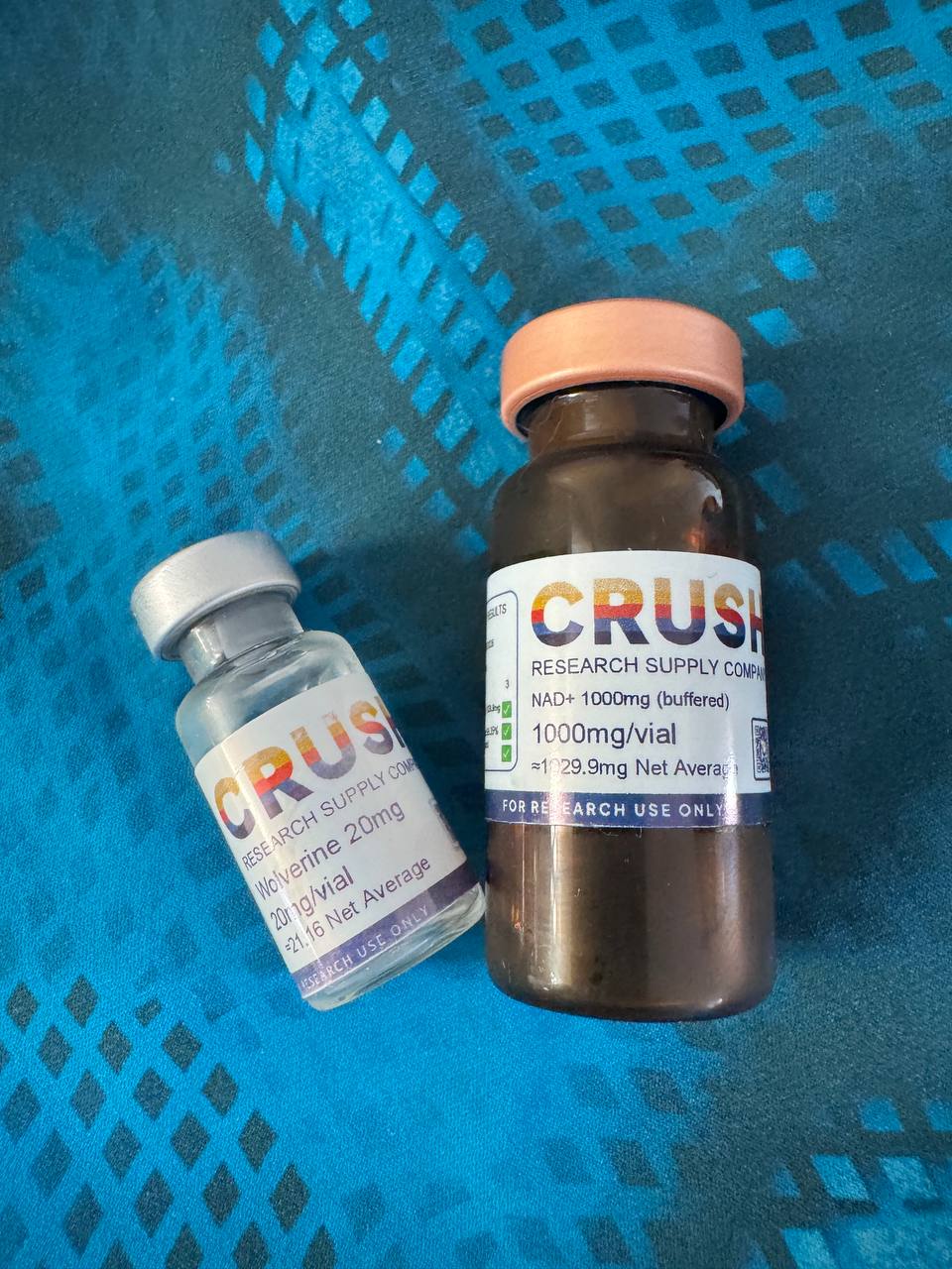 Real peptide vials — the actual product, in hand